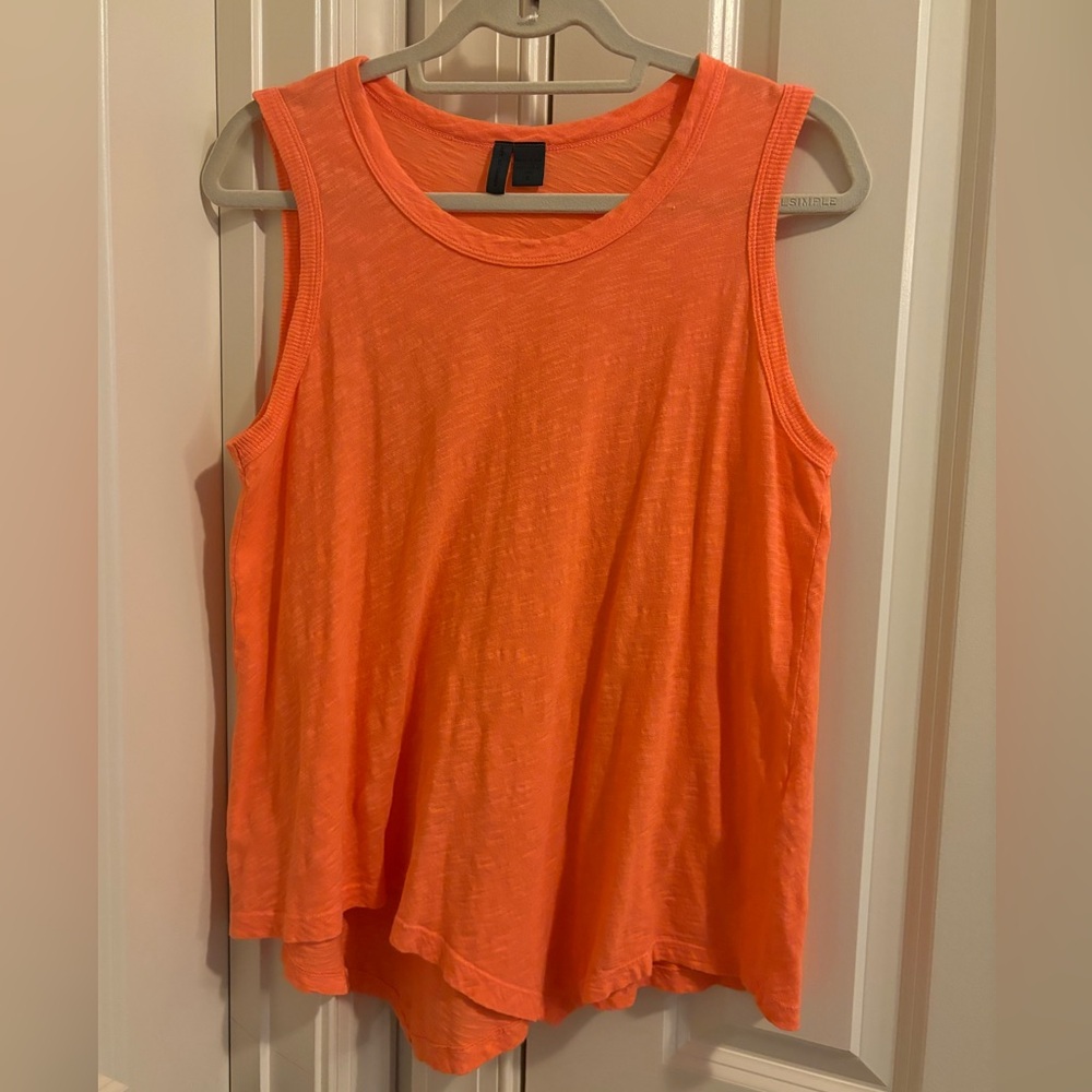 Left of center - ladies tank Size S - Color is Orange - washed but never worn